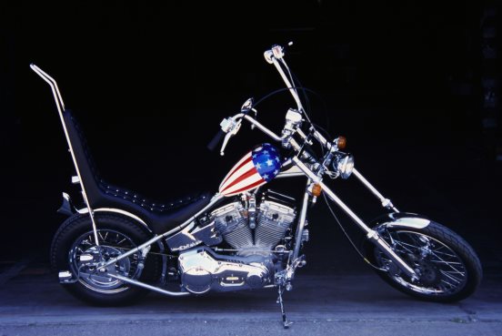 LEGENDARY MOTORBIKE RIDDEN BY PETER FONDA IN EASY RIDER COMES TO AUCTION WITH ‘NO RESERVE’ FROM THE GORDON GRANGER COLLECTION USA

ESTIMATE $300,000 - $500,000

 

The world’s most iconic motorcycle ‘Captain America’ from the counterculture classic film, Easy Rider will be sold at auction in midlAND TEXAS ON JUNE 5TH BY DAN KRUSE CLASSICS

 

The world’s most iconic motorcycle is going on the auction block in Midland, Texas on June 5th… Captain America from the counterculture classic film, Easy Rider, part of the Gordon Granger Collection, is being offered without reserve by Dan Kruse Classics. It is estimated by the auction house to sell for $300,000 to $500,000. The "Captain America" bike was named for its distinctive American flag colour scheme and known for its sharply-angled long front end.

 




Easy Rider showcased the hippie movement and gave America an insight into the lives of those individuals who wander the highways on the back of a motorcycle and hence the motorcycles themselves became characters in the 1969 film. Designed and built by Cliff Vaughs and Ben Hardy, four former police Harley-Davidson motorcycles were purchased at auction for $500 and rebuilt into two Captain Americas and two Billy Bikes.

 

Easy Rider is a 1969 American road drama film written by Peter Fonda, Dennis Hopper and Terry Southern, produced by Fonda, and directed by Hopper. Fonda and Hopper play two bikers who travel through the American South West carrying the proceeds of a drugs deal. The success of Easy Rider helped to spark a new Hollywood era of filmmaking during the early 1970s.

 

In 1996 the former owner of this bike, renowned celebrity vehicle collector, Gary Graham, sold the Captain American motorcycle at the Dan Kruse Classic Car Productions auction to Gordon Granger. Dan Haggerty was on site with Graham, his partner in the rebuild and restoration of the motorcycle, to authenticate, as it was, he that received the crashed pieces from Fonda and Hopper after the wrap of the film. Since then the motorcycle has resided in Austin, Texas where it survived a fire in December 2010.

 

Dan Kruse, owner of the auction house that bears his name, says: “This motorcycle is part of both American film history and automotive history too. It is a legend and is one of the iconic symbols of the 1960s. It represents a longing for a simpler life, one of adventure and the open road. It would grace any automotive collection be it private or in a museum.”

 




Along with Captain America, 23 other vehicles from the Gordon Granger Collection will be offered at auction on June 5th, all without reserve including: a 1927 Rolls-Royce Phantom 1 Springfield Limousine formally owned by Tallulah Bankhead. There are also a 1929 Rolls-Royce Phantom 1 Springfield Brewster Dual Cowl Phaeton, a 1930 Rolls-Royce Phantom Springfield Brewster Limousine, a 1929 Packard Model 626 Convertible, a 1954 Jaguar XK120 Roadster, a 1974 Jaguar E-Type Roadster and a 1964.5 Ford Mustang Convertible. Other notable vehicles being offered for sale will be two vehicles from the Gene Kennedy Collection, both perfect replicas of those featured in the Dukes of Hazzard: a 1969 Dodge Charger R/T 440 aka General Lee and a 1977 Dodge Monaco, driven by Sheriff Roscoe P Coltrane; four Corvettes from the Gene Plunk Collection including a first generation 1961 Convertible, a 1963 Split Window Coupe, and a 1964 Sting Ray Fastback; plus, from the Ken Dougherty Collection: a very rare restored 1966 Ford Bronco, a 1965 A-Code Ford Mustang Convertible, an E model 1957 Ford Thunderbird Convertible and a 1973 Volkswagen Super Beetle Convertible.

 

Over 150 vehicles are expected to cross the auction block in Midland on June 5th at the Horseshoe Pavilion. 



Easy Rider was released by Columbia Pictures on July 14, 1969, grossing $60 million worldwide from a filming budget of no more than $400,000. Critics praised the performances, directing, writing, soundtrack, and visuals. Hopper, Fonda and Southern were nominated for an Academy Award for Best Original Screenplay.

ABOUT US

DAN KRUSE CLASSICS

Dan Kruse Classics has over 200 years of combined experience in the auction event business.



Based in San Antonio, Texas, Dan Kruse Classics has been the premier classic car auction house serving the entire United States since 1972. The company regards all consignors, bidders, fans and team members as family and takes pride in working with the best in the business. The company was founded by Daniel Kruse, a licensed auctioneer and classic car expert and is run by members of the Kruse family.